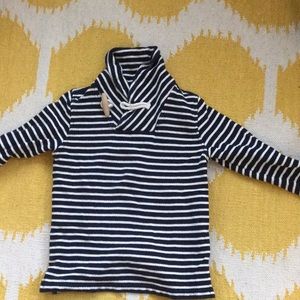 White and black shawl collar sweatshirt.